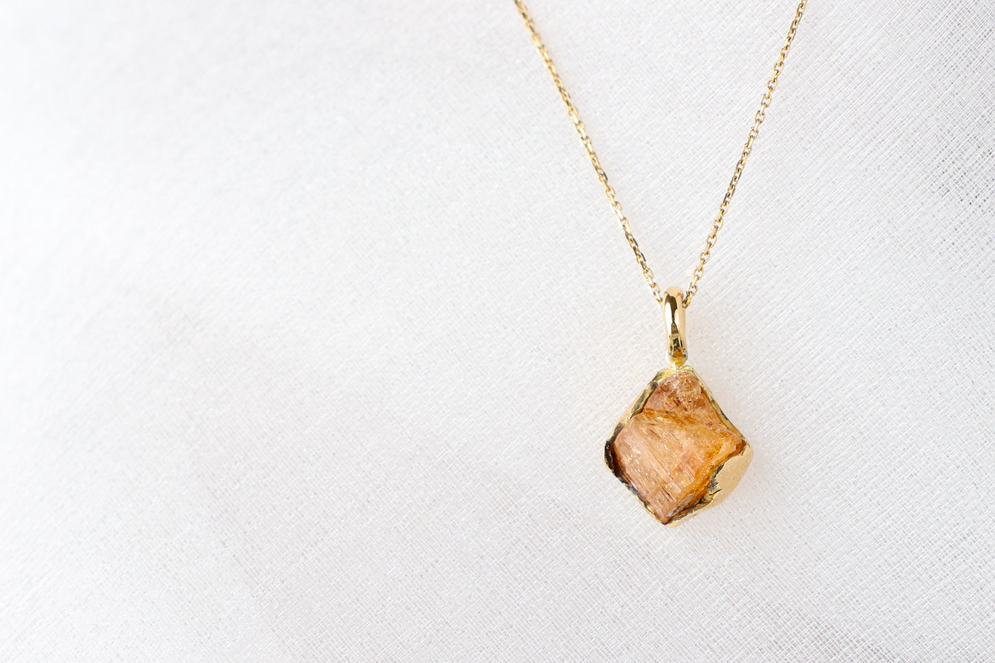Solene Gold Pendant on white background