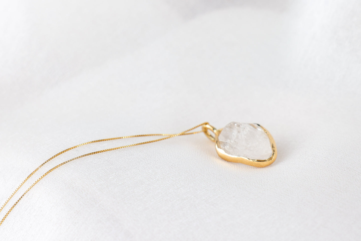 Pravāha – Clear Quartz 18k Gold Pendant